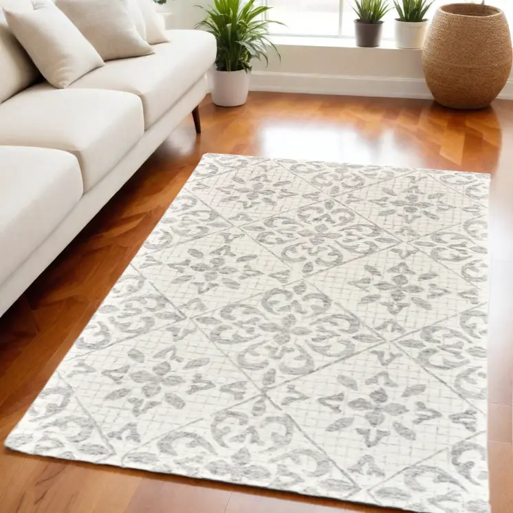 5' X 8' Ivory and Gray Wool Floral Hand Tufted Area Rug