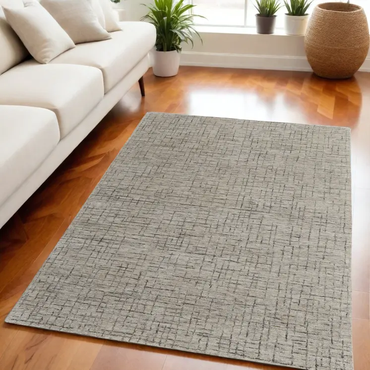5' X 8' Ivory and Gray Wool Hand Tufted Distressed Area Rug