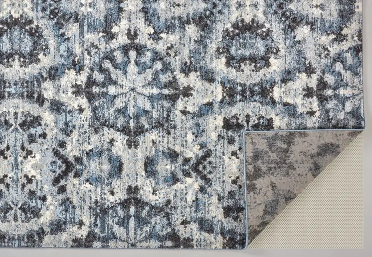 5' X 8' Blue Black and Ivory Ikat Power Loom Area Rug