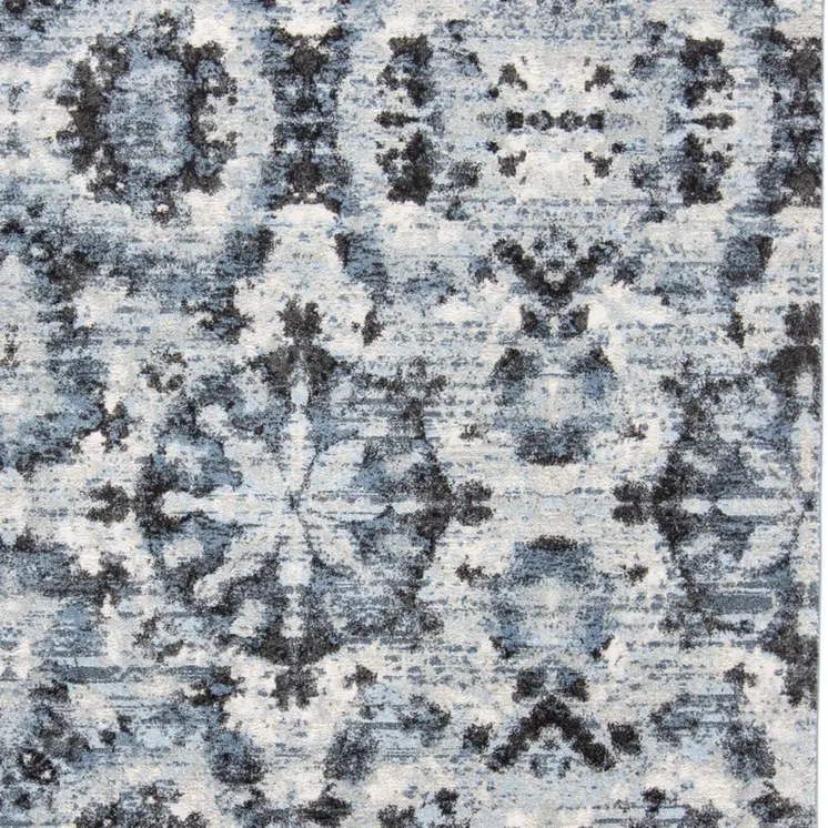 5' X 8' Blue Black and Ivory Ikat Power Loom Area Rug