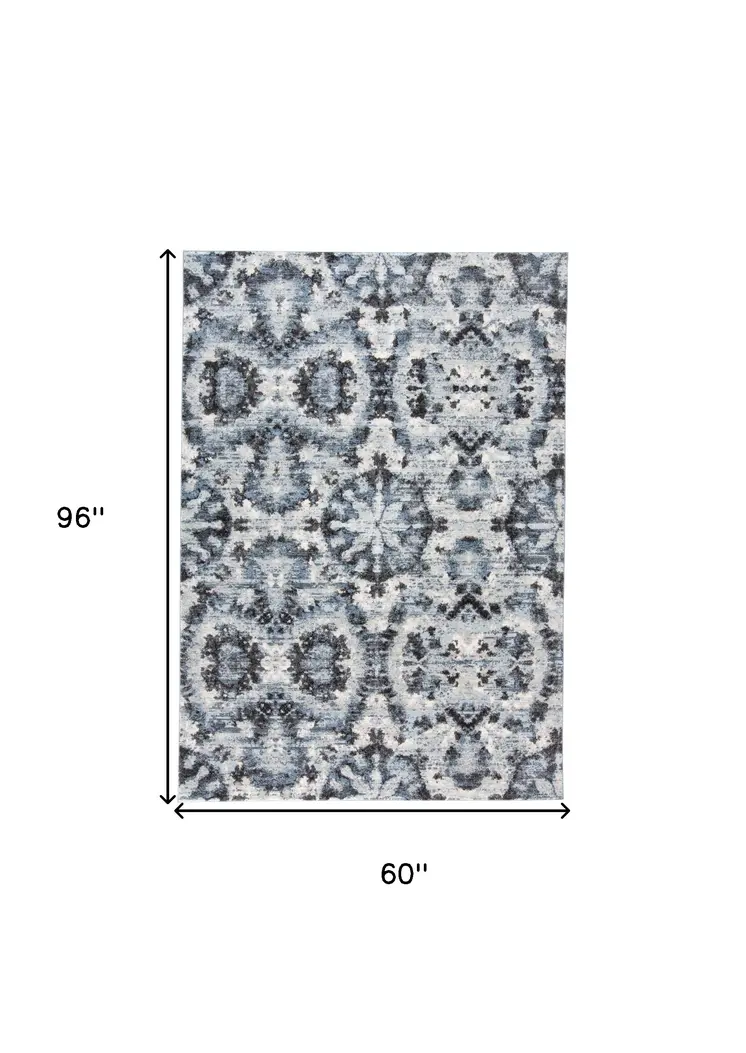5' X 8' Blue Black and Ivory Ikat Power Loom Area Rug