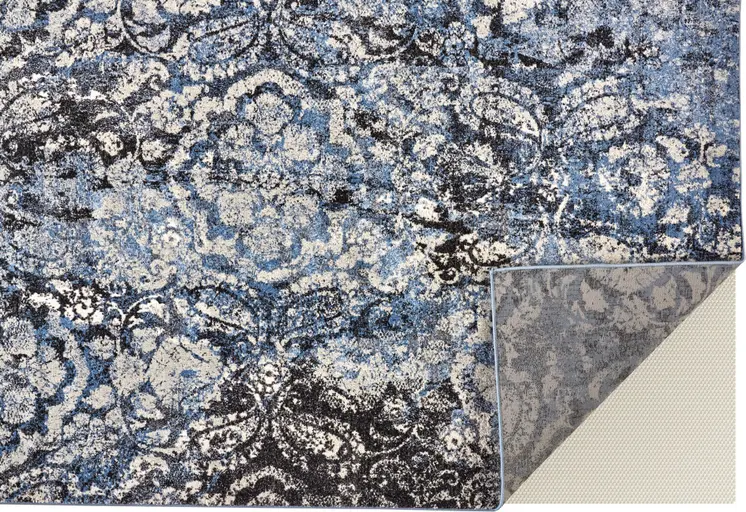 8' X 11' Blue Black and Ivory Abstract Power Loom Distressed Area Rug