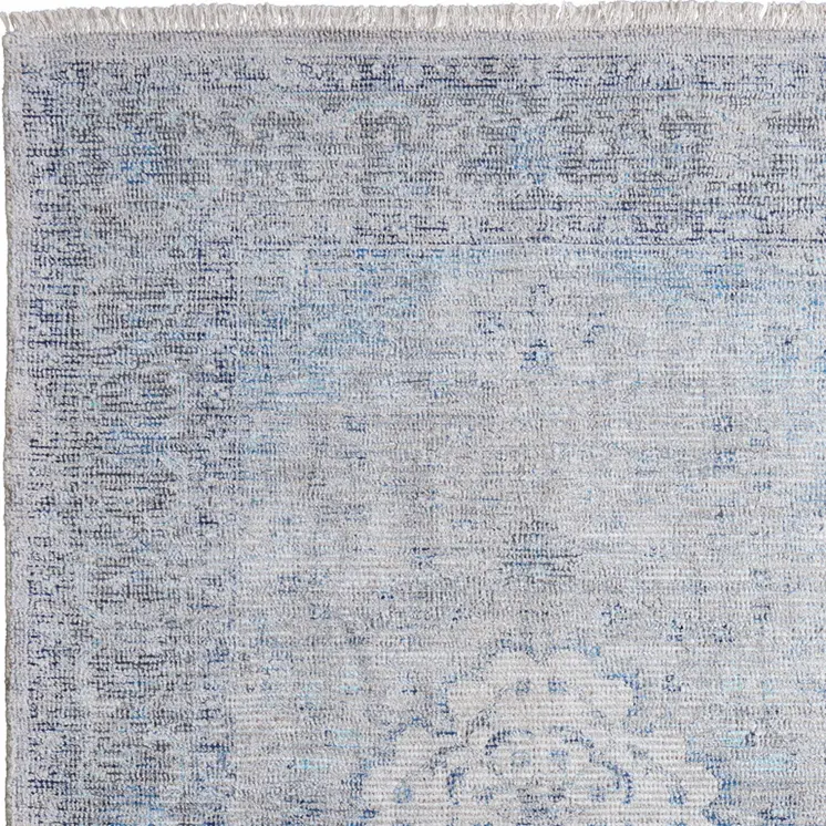 4' X 6' Gray Blue and Ivory Oriental Hand Woven Distressed Area Rug With Fringe
