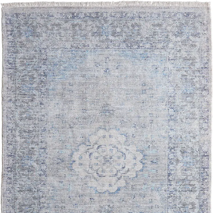 9' X 12' Gray Blue and Ivory Oriental Hand Woven Distressed Area Rug With Fringe