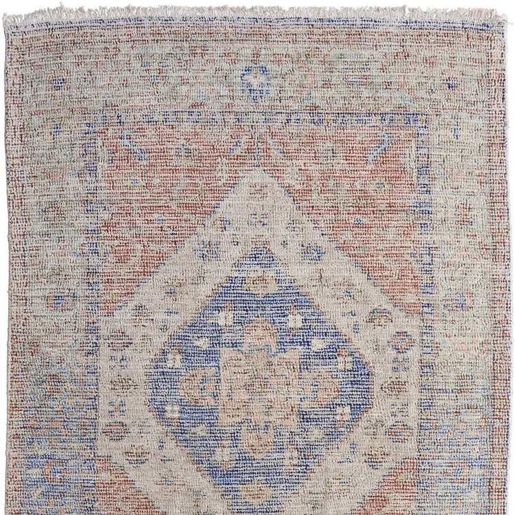 5' X 8' Red Blue and Ivory Abstract Hand Woven Distressed Area Rug With Fringe