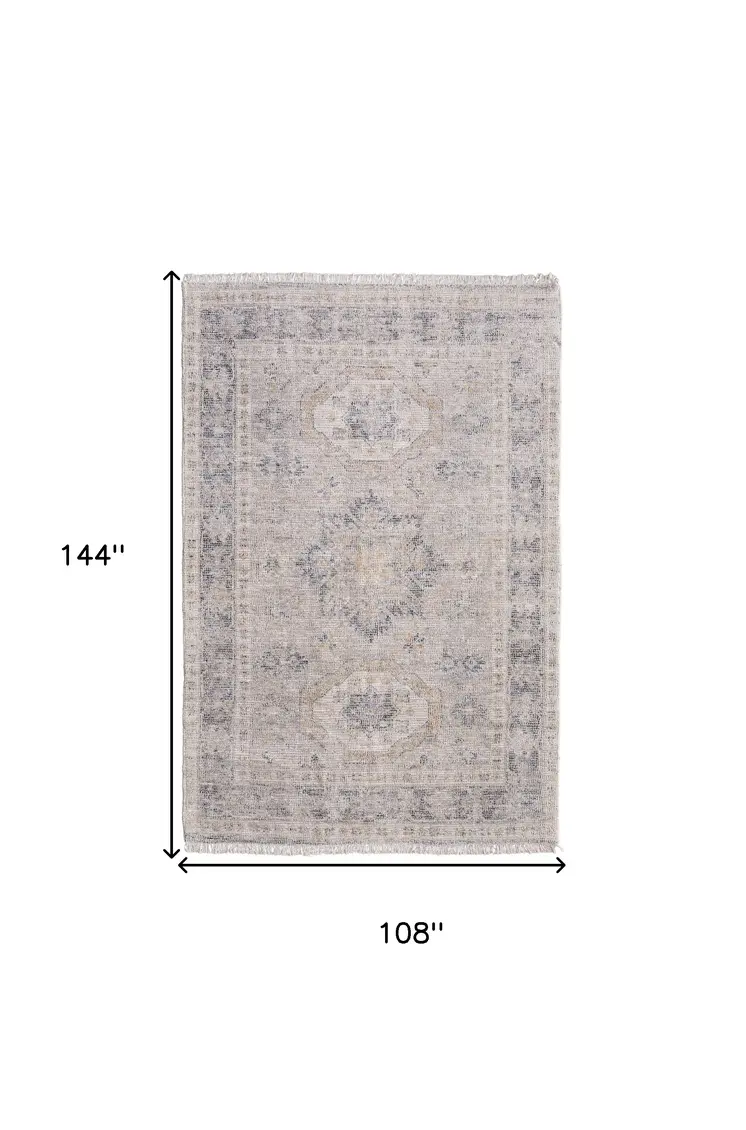 9' X 12' Tan and Gray Oriental Hand Woven Distressed Area Rug With Fringe