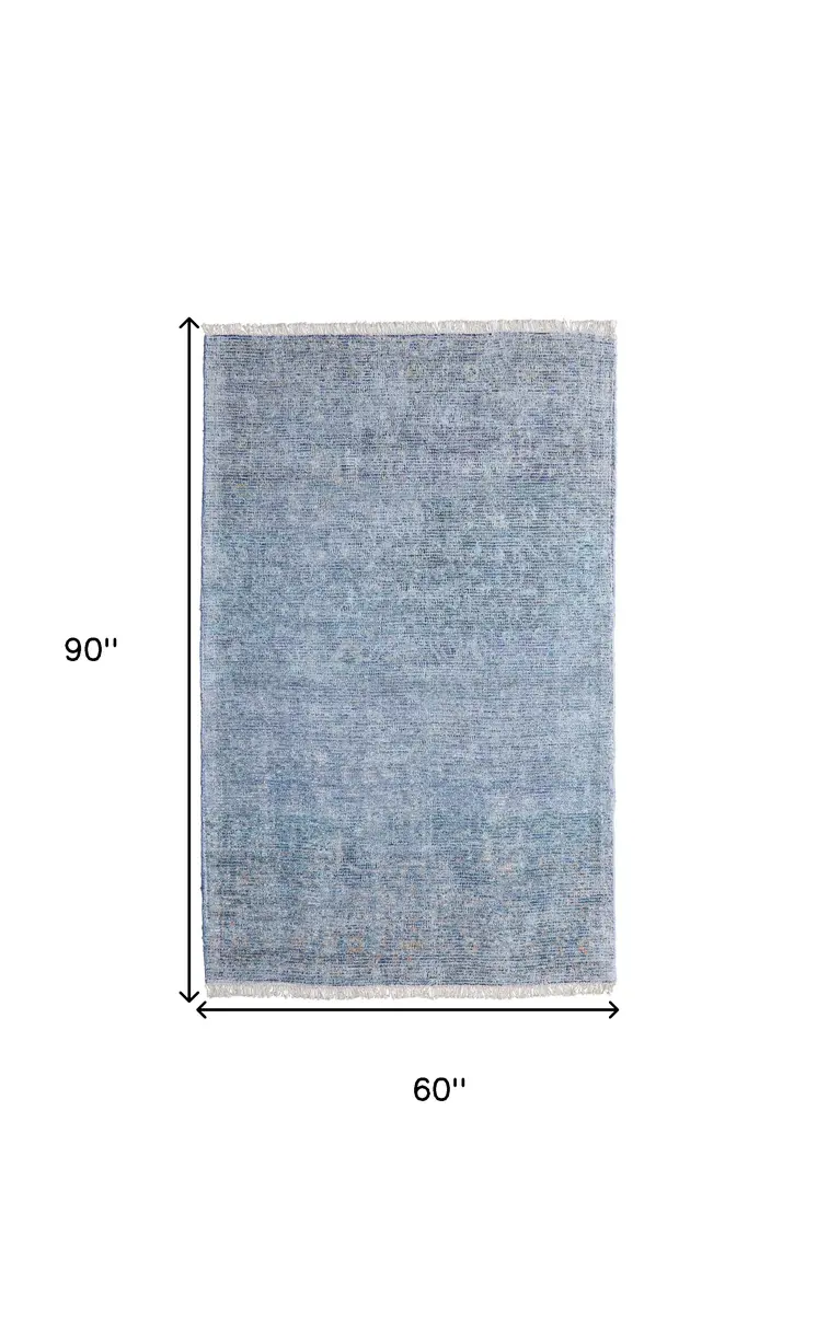 5' X 8' Blue and Gray Abstract Hand Woven Distressed Area Rug With Fringe