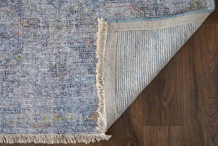 4' X 6' Blue and Ivory Abstract Hand Woven Distressed Area Rug With Fringe