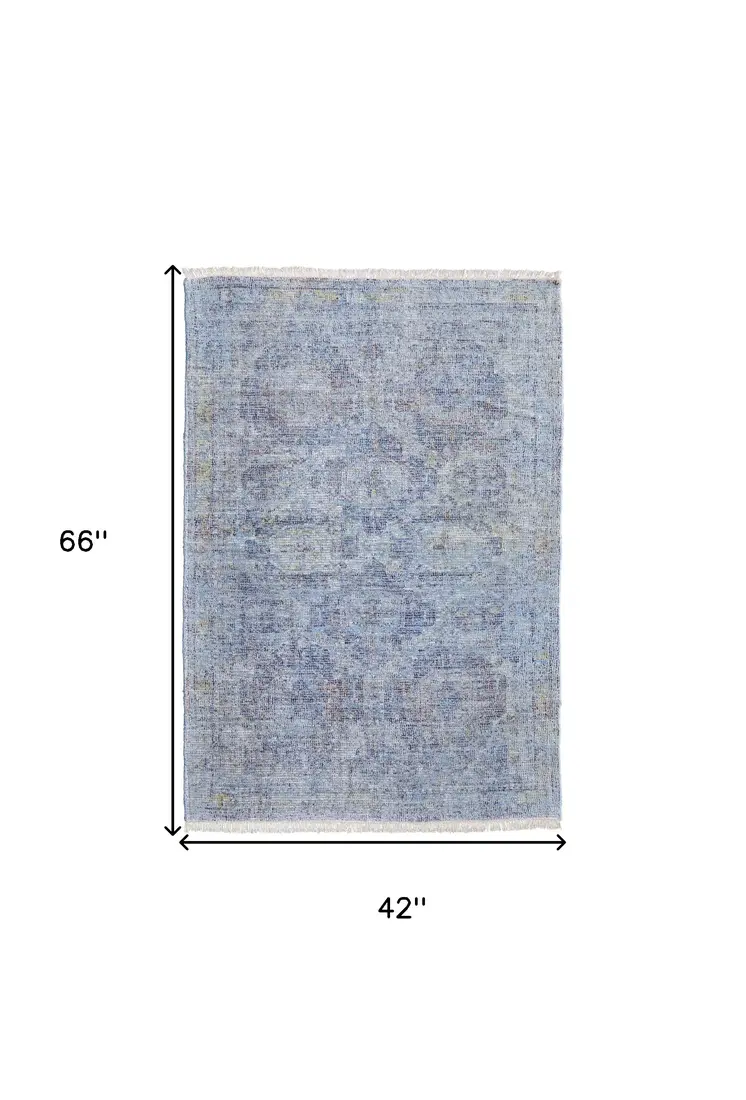 4' X 6' Blue and Ivory Abstract Hand Woven Distressed Area Rug With Fringe