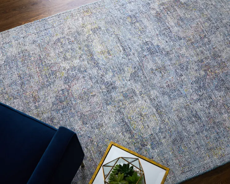 5' X 8' Blue and Ivory Abstract Hand Woven Distressed Area Rug With Fringe
