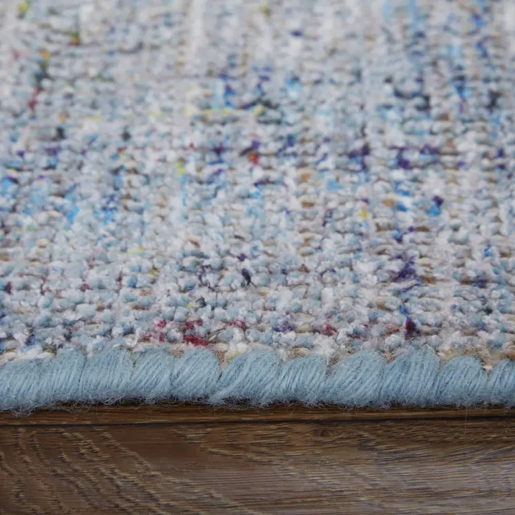 5' X 8' Blue and Ivory Abstract Hand Woven Distressed Area Rug With Fringe