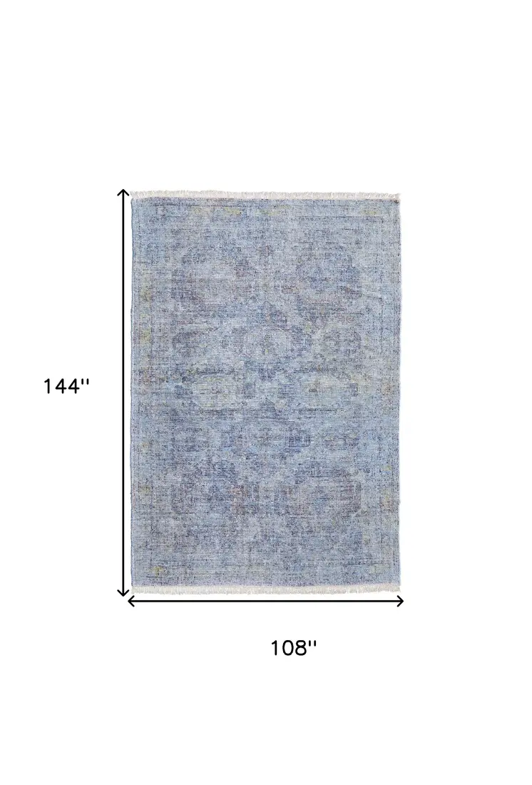 9' X 12' Blue and Ivory Abstract Hand Woven Distressed Area Rug With Fringe