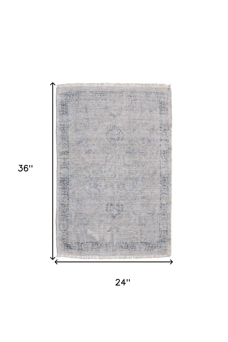 2' X 3' Gray Blue and Taupe Abstract Hand Woven Distressed Area Rug With Fringe