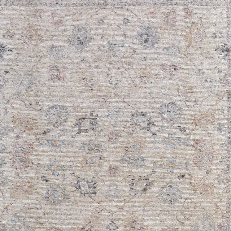 4' X 6' Ivory Tan and Blue Floral Hand Woven Distressed Area Rug With Fringe