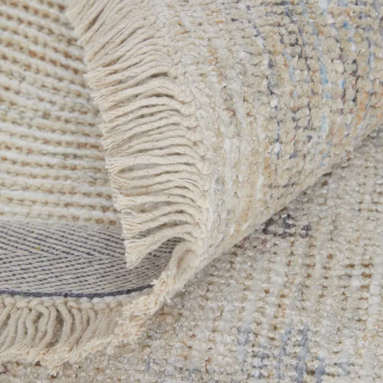 2' X 3' Ivory Tan and Blue Floral Hand Woven Distressed Area Rug With Fringe