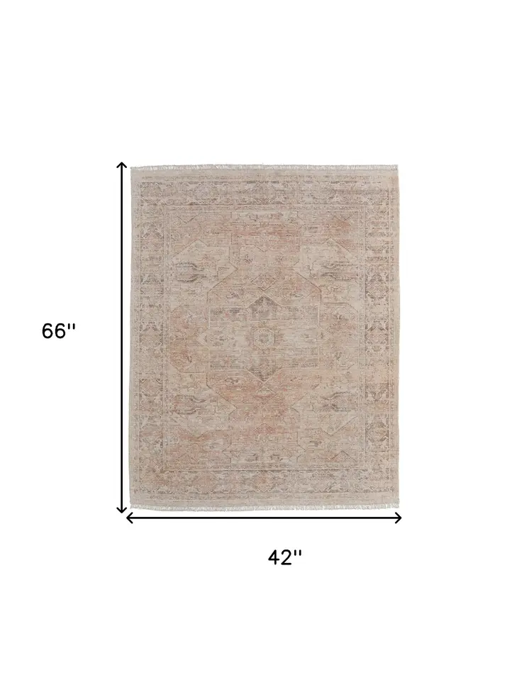 4' X 6' Tan Orange and Ivory Oriental Hand Woven Distressed Area Rug With Fringe