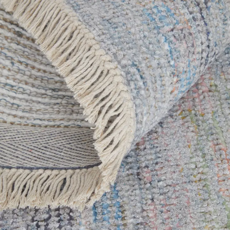 8' X 10' Orange Blue and Gold Floral Hand Woven Distressed Area Rug With Fringe