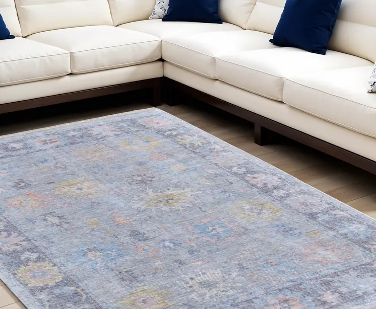 8' X 10' Orange Blue and Gold Floral Hand Woven Distressed Area Rug With Fringe