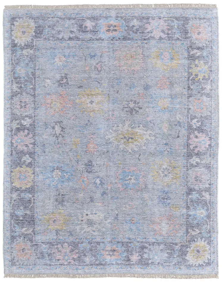 8' X 10' Orange Blue and Gold Floral Hand Woven Distressed Area Rug With Fringe