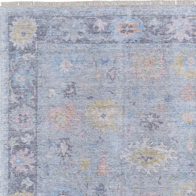 10' X 14' Orange Blue and Gold Floral Hand Woven Distressed Area Rug With Fringe