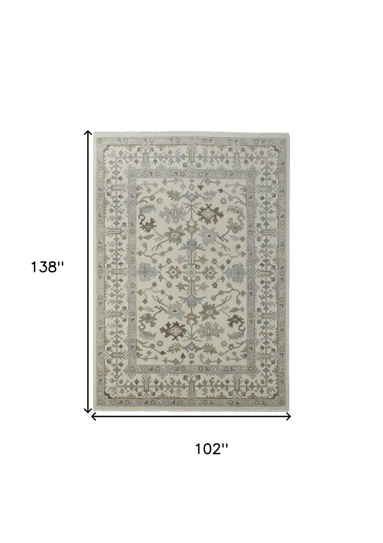8' X 12' Ivory Gray and Brown Wool Floral Hand Knotted Area Rug With Fringe