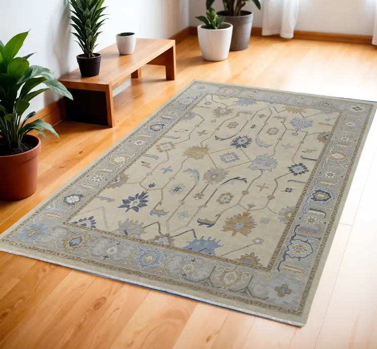 4' X 6' Gray Ivory and Blue Wool Floral Hand Knotted Area Rug With Fringe