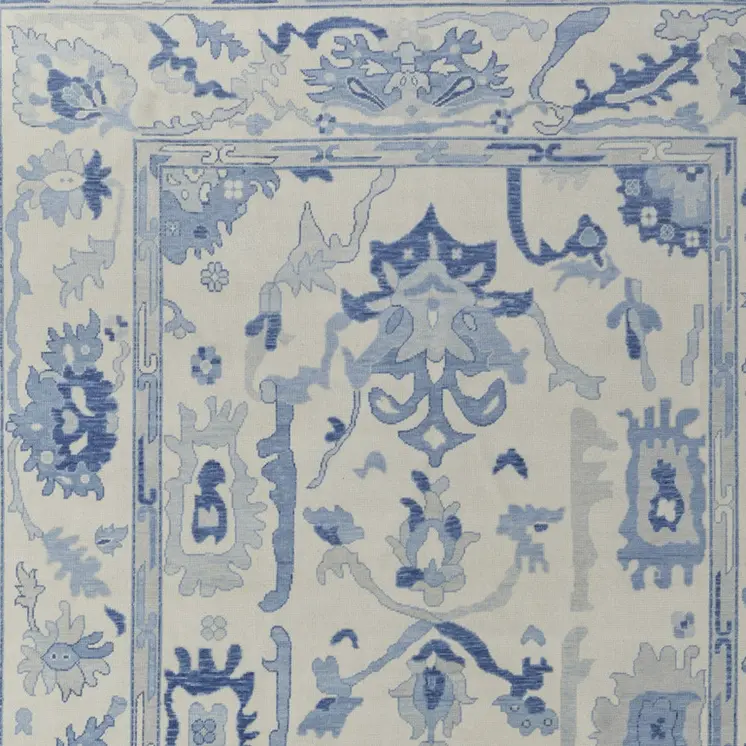 8' X 10' Ivory and Blue Wool Floral Hand Knotted Area Rug With Fringe