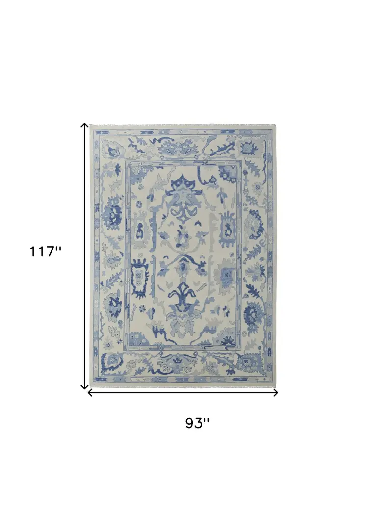 8' X 10' Ivory and Blue Wool Floral Hand Knotted Area Rug With Fringe