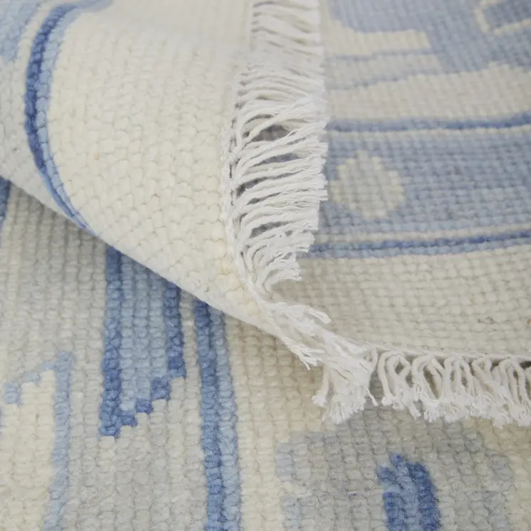 9' X 13' Ivory and Blue Wool Floral Hand Knotted Area Rug With Fringe