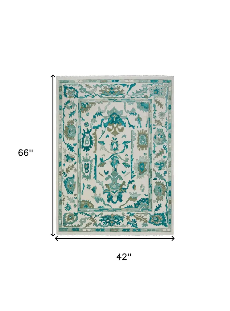 4' X 6' Green and Ivory Wool Floral Hand Knotted Area Rug With Fringe