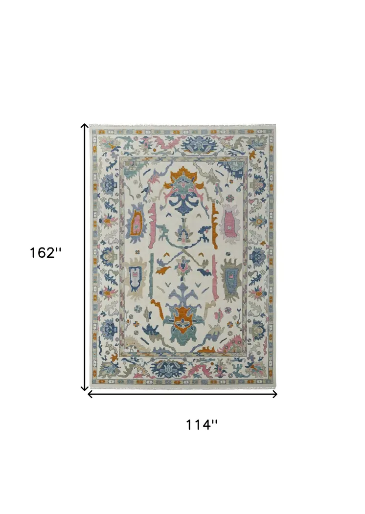 9' X 13' Blue Ivory and Pink Wool Floral Hand Knotted Area Rug With Fringe