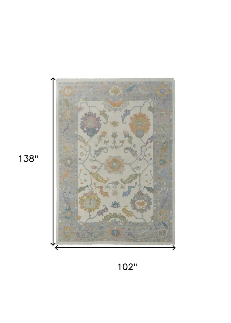 8' X 12' Gray Ivory and Orange Wool Floral Hand Knotted Area Rug With Fringe