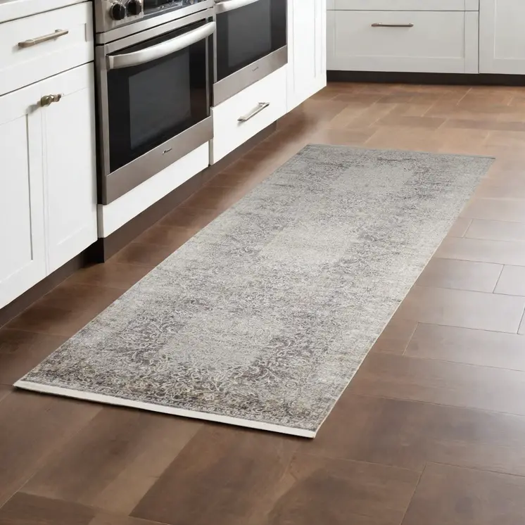8' Gray and Ivory Oriental Power Loom Worn Faded Runner Rug