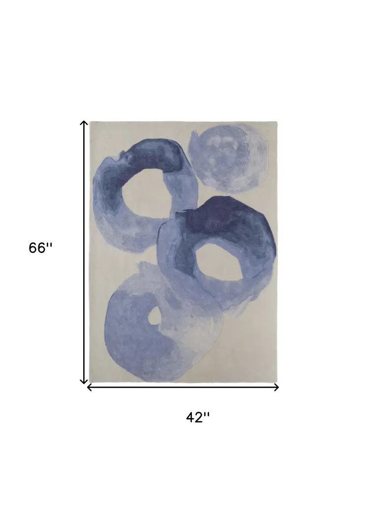4' X 6' Blue and Ivory Abstract Hand Tufted Area Rug