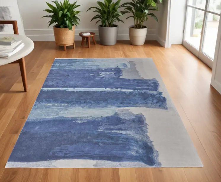 4' X 6' Blue and Ivory Abstract Hand Tufted Area Rug