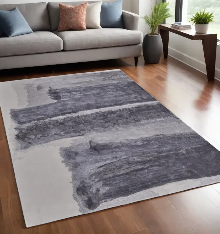 5' X 8' Dark Gray and Ivory Abstract Hand Tufted Area Rug