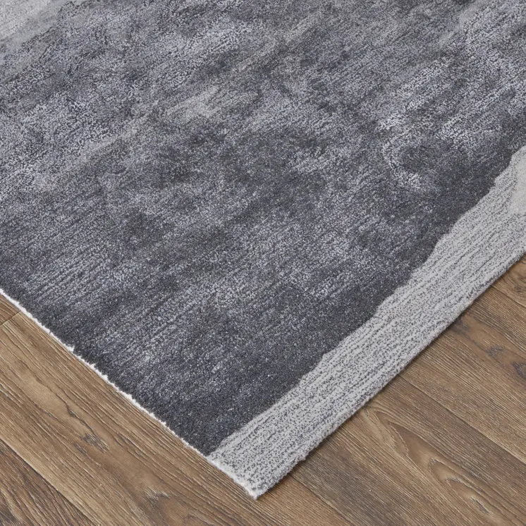 2' X 3' Dark Gray and Ivory Abstract Hand Tufted Area Rug