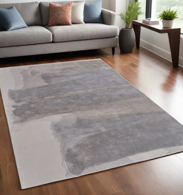 5' X 8' Gray and Ivory Abstract Hand Tufted Area Rug