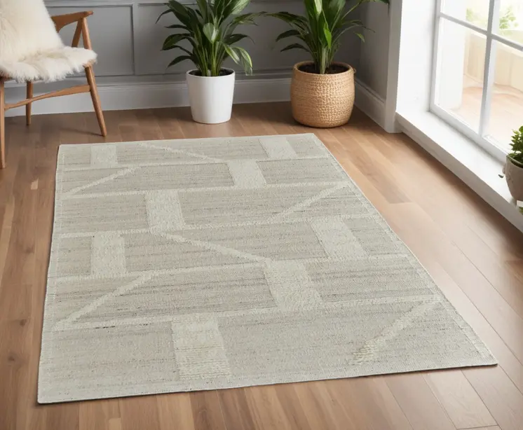 4' X 6' Tan and Ivory Wool Geometric Hand Woven Area Rug