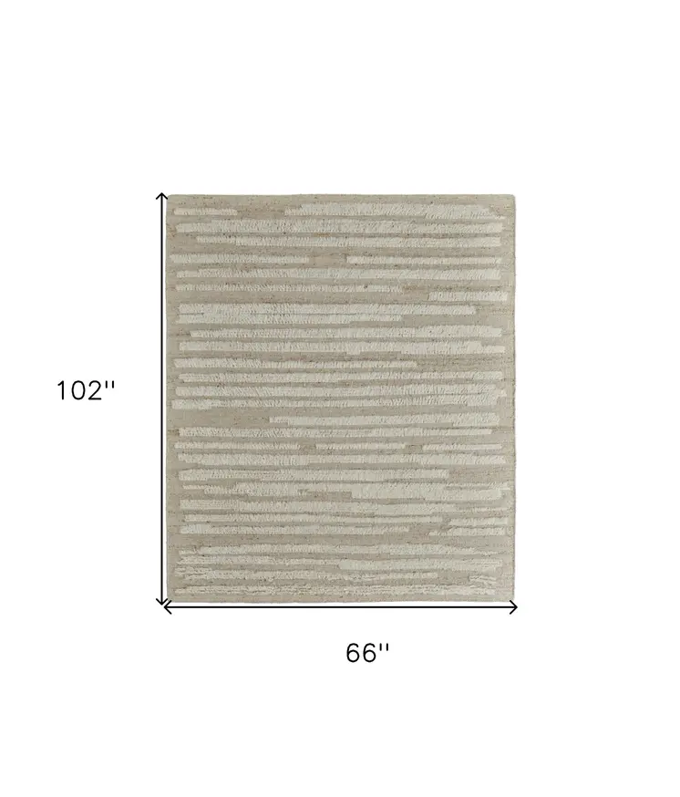 6' X 9' White and Tan Wool Striped Hand Woven Area Rug