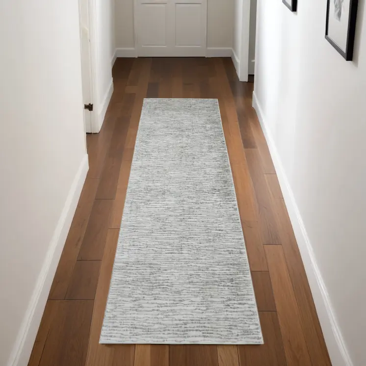 8' Ivory Gray and Green Abstract Power Loom Worn Faded Runner Rug