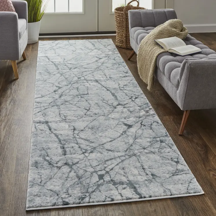 8' Gray and Ivory Abstract Power Loom Worn Faded Runner Rug