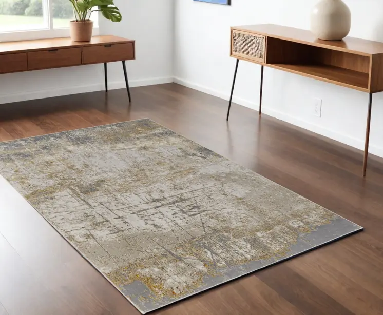 4' X 6' Ivory Gray and Brown Abstract Power Loom Worn Faded Area Rug