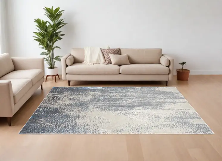 8' X 10' Ivory Gray and Blue Abstract Power Loom Area Rug