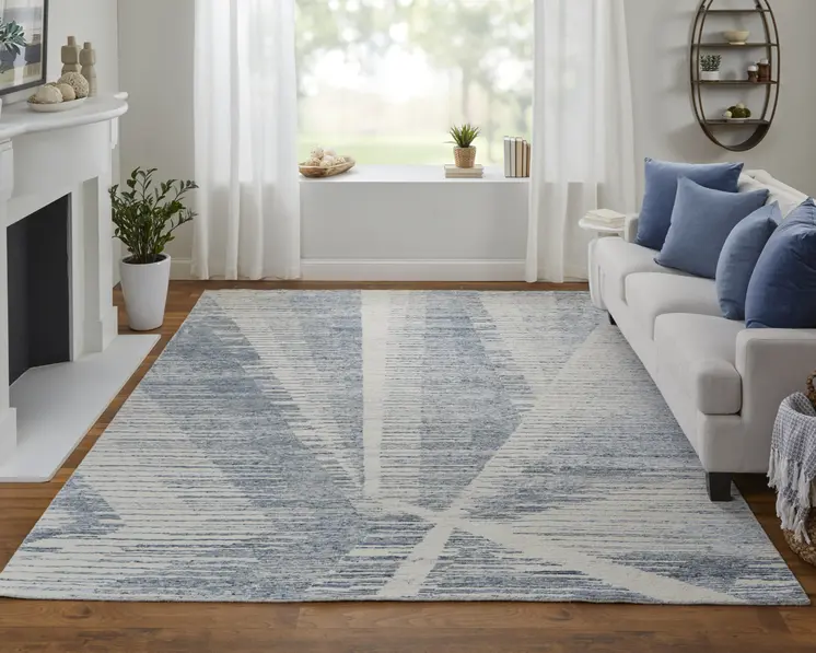 4' X 6' Ivory and Blue Abstract Hand Knotted Worn Faded Area Rug