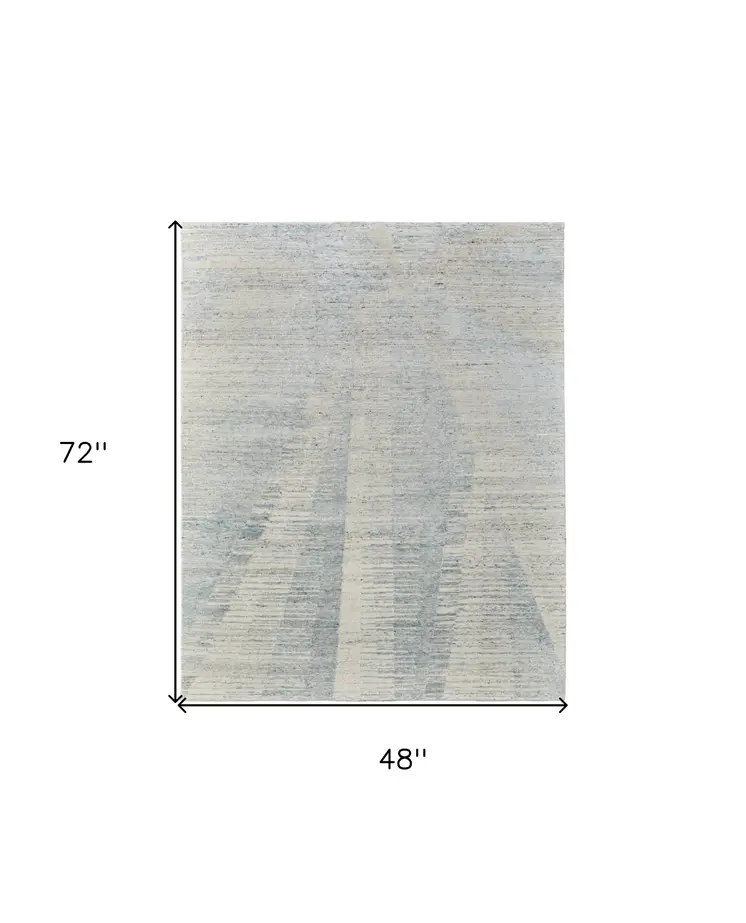 4' X 6' Ivory and Blue Abstract Hand Knotted Worn Faded Area Rug
