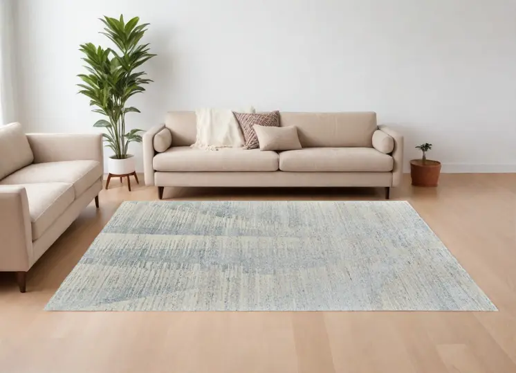 6' X 9' Ivory and Blue Abstract Hand Knotted Worn Faded Area Rug