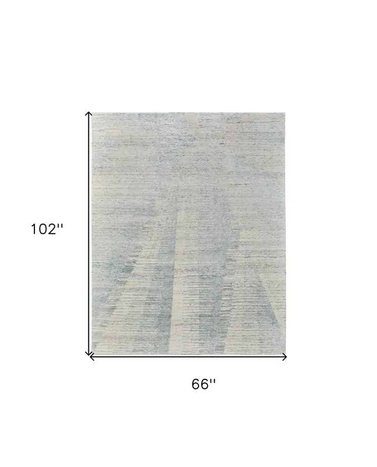 6' X 9' Ivory and Blue Abstract Hand Knotted Worn Faded Area Rug