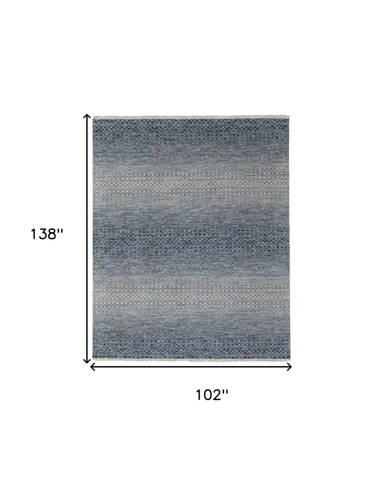 8' X 12' Ivory Gray and Blue Wool Hand Knotted Area Rug With Fringe
