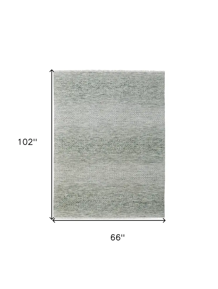 6' X 9' Ivory and Green Wool Hand Knotted Area Rug With Fringe